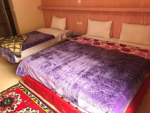Hotel taborihte客房内的一张或多张床位