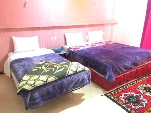 Hotel taborihte客房内的一张或多张床位