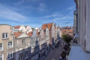 Nespecifikovaný výhled na destinaci Gdaňsk nebo výhled na město při pohledu z apartmánu