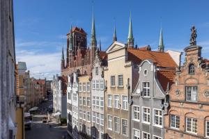 Nespecifikovaný výhled na destinaci Gdaňsk nebo výhled na město při pohledu z apartmánu