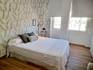 Posteľ alebo postele v izbe v ubytovaní Apartamento acogedor con la mejor ubicación.