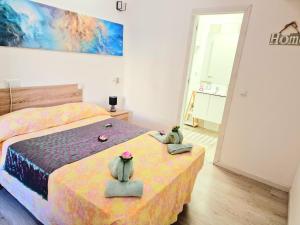 Postel nebo postele na pokoji v ubytování Daniel Beachfront, 2 Rooms Wifi Free