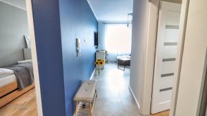 Posteľ alebo postele v izbe v ubytovaní Apartament Honoratka