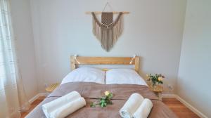 Posteľ alebo postele v izbe v ubytovaní Apartament Honoratka + 13 fotografií