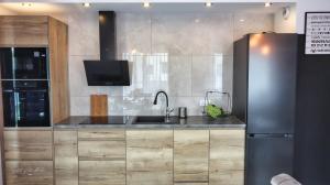 Kuchyňa alebo kuchynka v ubytovaní Apartament Honoratka