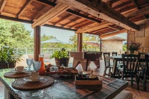 a patio with a table and a piano at Casa Vacacional en Vilagarcía de Arousa in Vilagarcia de Arousa