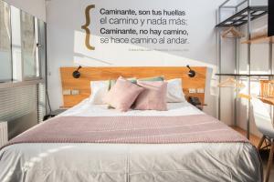Postel nebo postele na pokoji v ubytování Verso Hotel