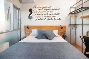 Postel nebo postele na pokoji v ubytování Verso Hotel