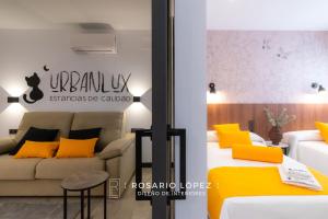 A bed or beds in a room at Urbanlux Olimpia Sleep & Park