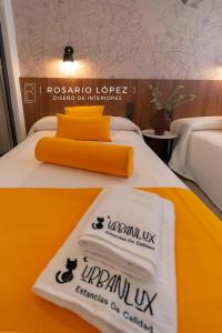 A bed or beds in a room at Urbanlux Olimpia Sleep & Park