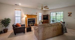 A seating area at Mountain Majesty with Hot Tub, Pool Table, Generator, EV Hookup