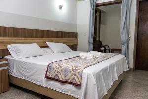 Letto o letti in una camera di Das Heim Hotel