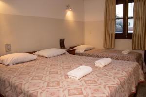 Letto o letti in una camera di Das Heim Hotel