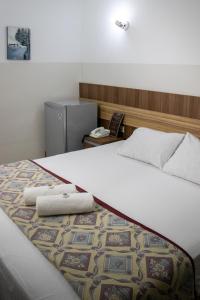 Postel nebo postele na pokoji v ubytování Das Heim Hotel
