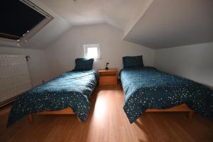 Postel nebo postele na pokoji v ubytování Le Paradis Mosan