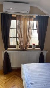 Postel nebo postele na pokoji v ubytování Guesthouse 12a