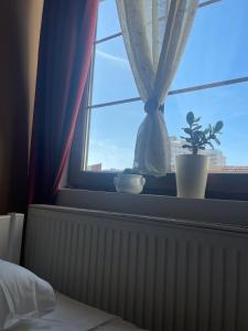 Postel nebo postele na pokoji v ubytování Guesthouse 12a