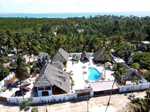 an aerial view of a resort with a pool at Emerald Dreams Boutique Hotel in Michamvi