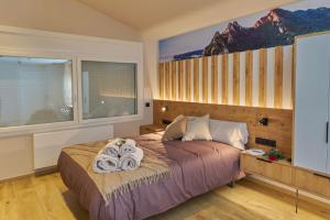 Postel nebo postele na pokoji v ubytování HOTEL LA CABANA BERGA
