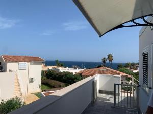 a view from the balcony of a house at La maison du bonheur in Fontane Bianche