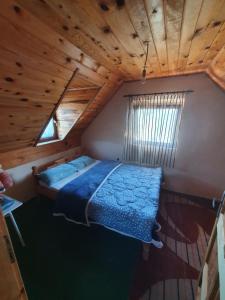 Postel nebo postele na pokoji v ubytování Vikendica Vodice