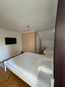 Postel nebo postele na pokoji v ubytování Guesthouse 12a