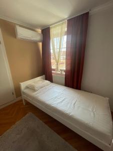 Postel nebo postele na pokoji v ubytování Guesthouse 12a