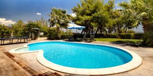 Swimmingpoolen hos eller tæt på Villa Aggeliki