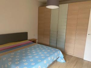 Posteľ alebo postele v izbe v ubytovaní Casa Bormio