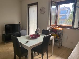 Televízia a/alebo spoločenská miestnosť v ubytovaní Casa Bormio + 2 fotografie