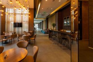 Lounge alebo bar v ubytovaní Royal Palm Tower Anhanguera