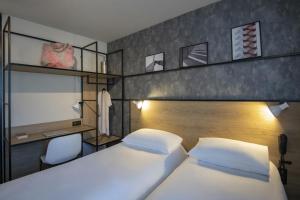 Postel nebo postele na pokoji v ubytování ibis Gap Centre