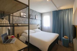 Postel nebo postele na pokoji v ubytování ibis Gap Centre