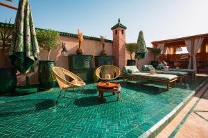 Bazén v ubytování Riad Ksar Al Amal & Spa nebo v jeho okolí