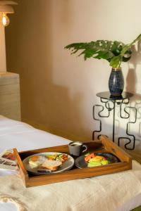 a tray with two plates of food on a table at La Valise San Miguel de Allende in San Miguel de Allende