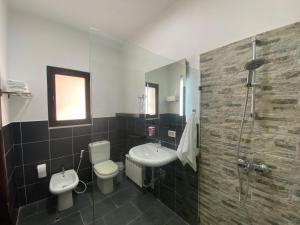 Ein Badezimmer in der Unterkunft Lemon Tree Residence