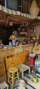 a kitchen with a counter with a lot of items at Atlas Room in Midelt