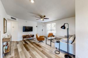 a living room with a couch and a tv at Canyon View #1203 in Tucson