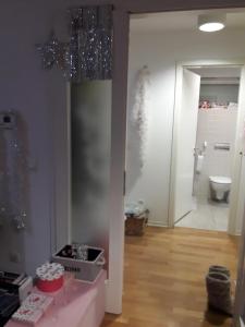 a bathroom with a sink and a toilet in a room at Apartments with parking spaces Sveta Nedelja, Prigorje - 17613 in Sveta Nedelja