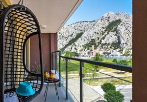 Fotografia z galérie ubytovania Apartments with a parking space Omis - 17677 v Omise