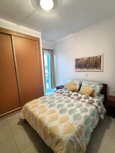 a bedroom with a large bed in a room at New, Modern, and Cozy 3 Bedroom Apartment. in Santa Maria