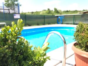 Fotografia z galérie ubytovania Family friendly apartments with a swimming pool Ostarski Stanovi, Plitvice - 17806 v Rakovici