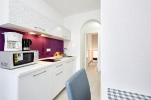 Kuchyňa alebo kuchynka v ubytovaní Apartment Mavarstica 17803d
