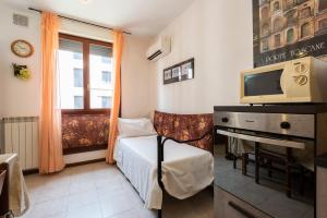 A seating area at Castelnuovo Flat with Elevator and Free Parking