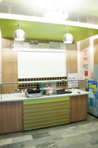 a fast food counter in a fast food restaurant at GV Hotel - Catbalogan in Catbalogan