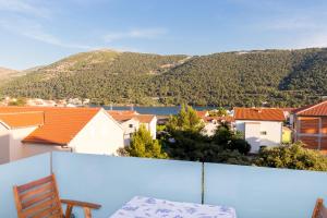 a view from the balcony of a house at Apartments and rooms with parking space Grebastica, Sibenik - 17831 in Šibenik