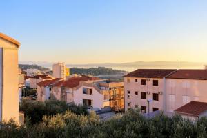 a view of a city with buildings in the foreground at Apartments and rooms with parking space Makarska - 18028 in Makarska