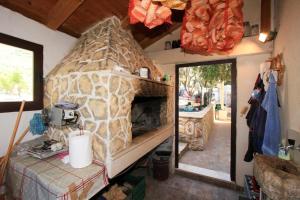 Kuchyňa alebo kuchynka v ubytovaní Family friendly seaside apartments Dingac - Borak, Peljesac - 18065 + 18 fotografií
