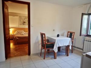 Un pat sau paturi într-o cameră la Apartments and rooms with parking space Starigrad, Paklenica - 18034 +53 fotografii