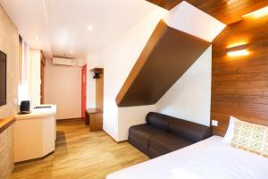 Ένα ή περισσότερα κρεβάτια σε δωμάτιο στο Lychee Sunset Hotel Cheung Chau